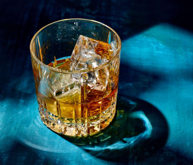 Delhi Whisky Gin Price Cut 2026 with premium imported whisky and gin bottles