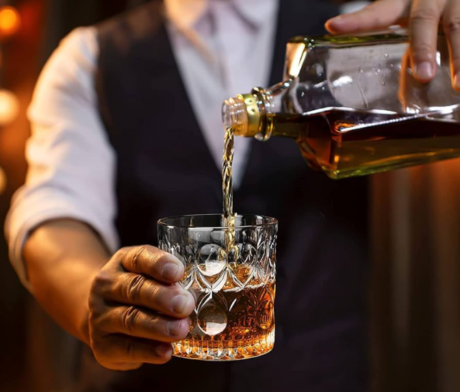 Delhi Whisky Gin Price Cut 2026 with premium imported whisky and gin bottles
